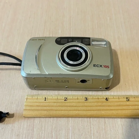 Samsung Film Camera ECX105-Zoom 38-105mm Lens Gold Turns On “UNTESTED” Read Blw
